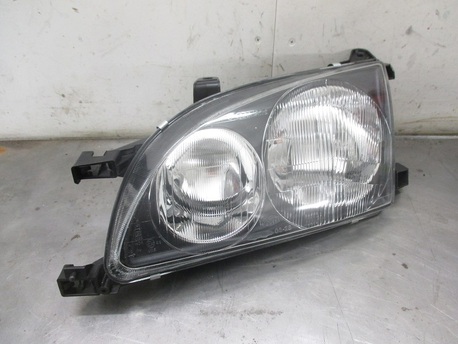 TOYOTA AVENSIS ´98-00 - E-LYHTY ( H7+H7 ) VASEN