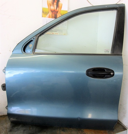 etuovi vasen - Hyundai Santa Fe  ´03